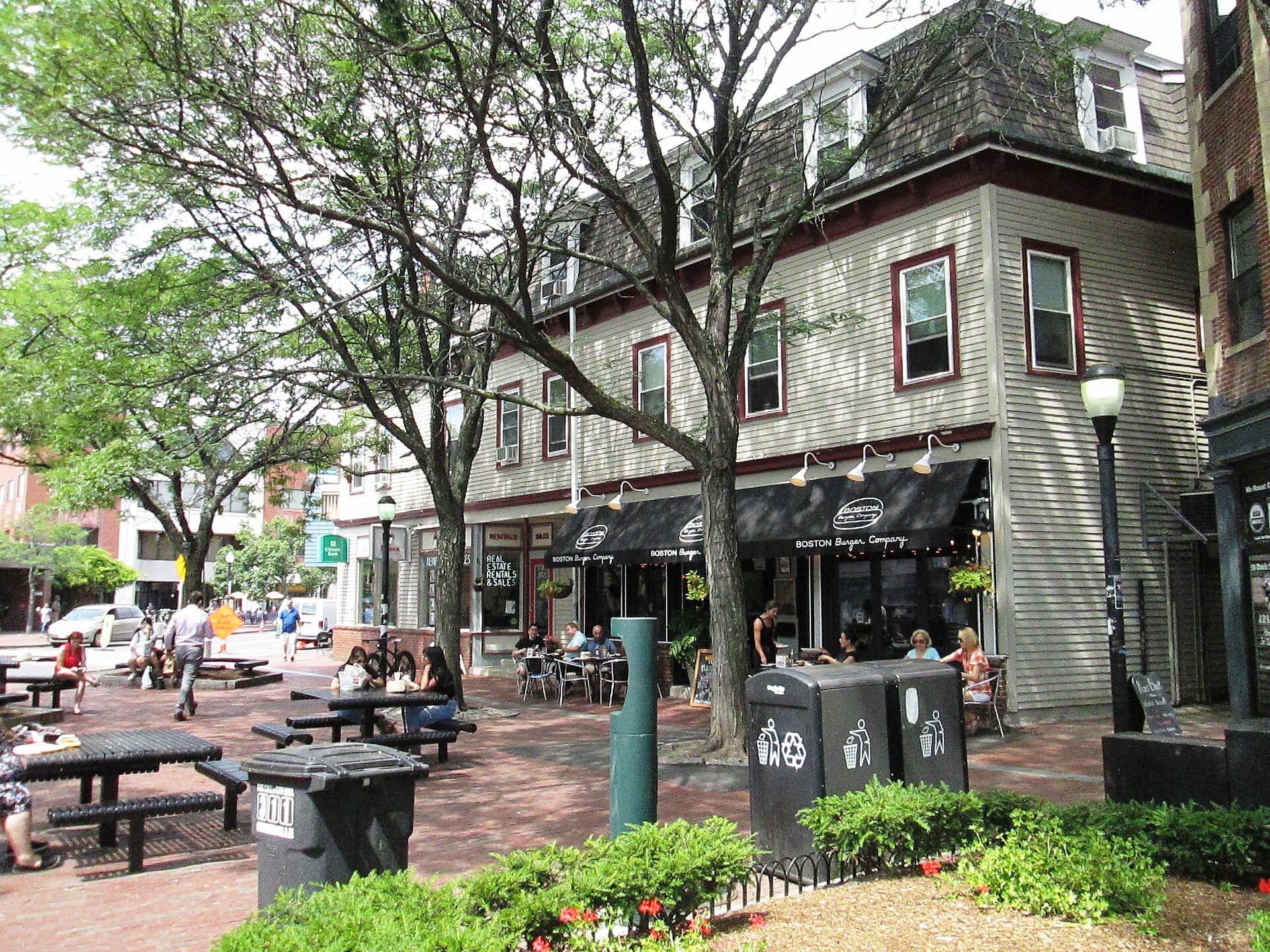 Shops and outdoor seating in Davis Square, Somerville